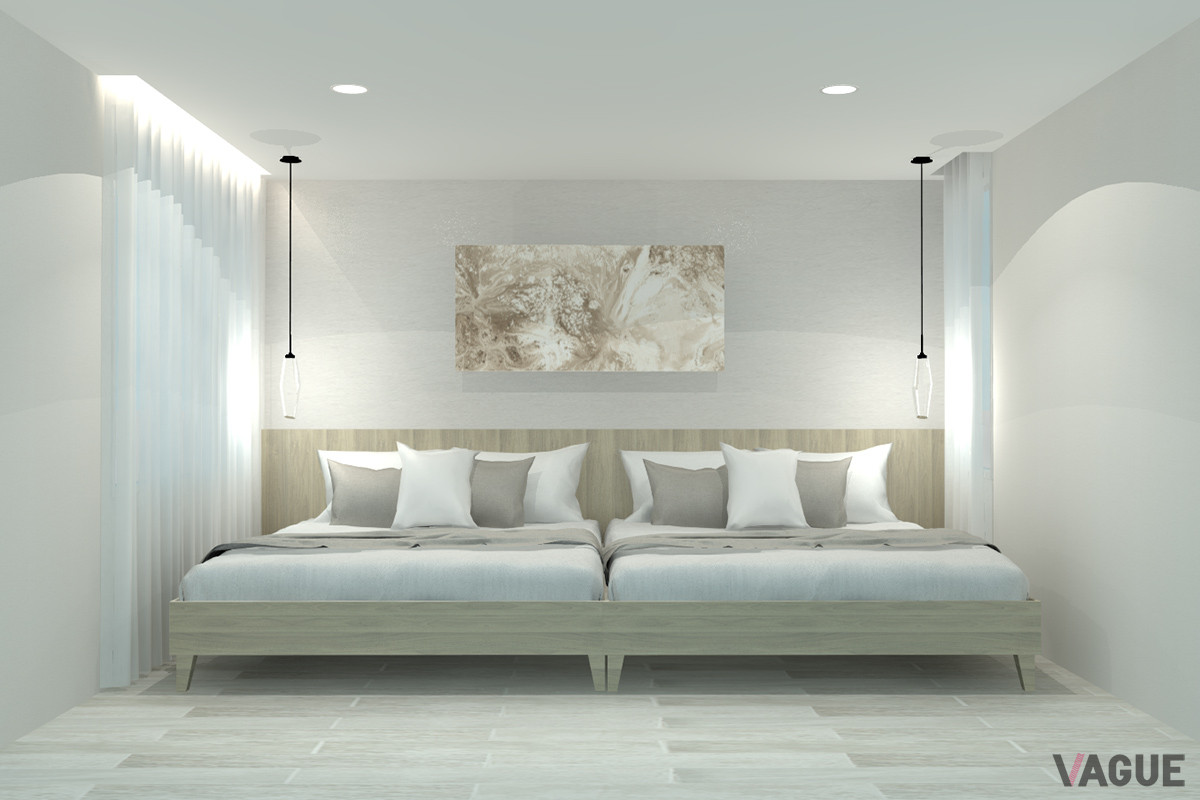 クリーンな雰囲気にまとめられたベッドルーム