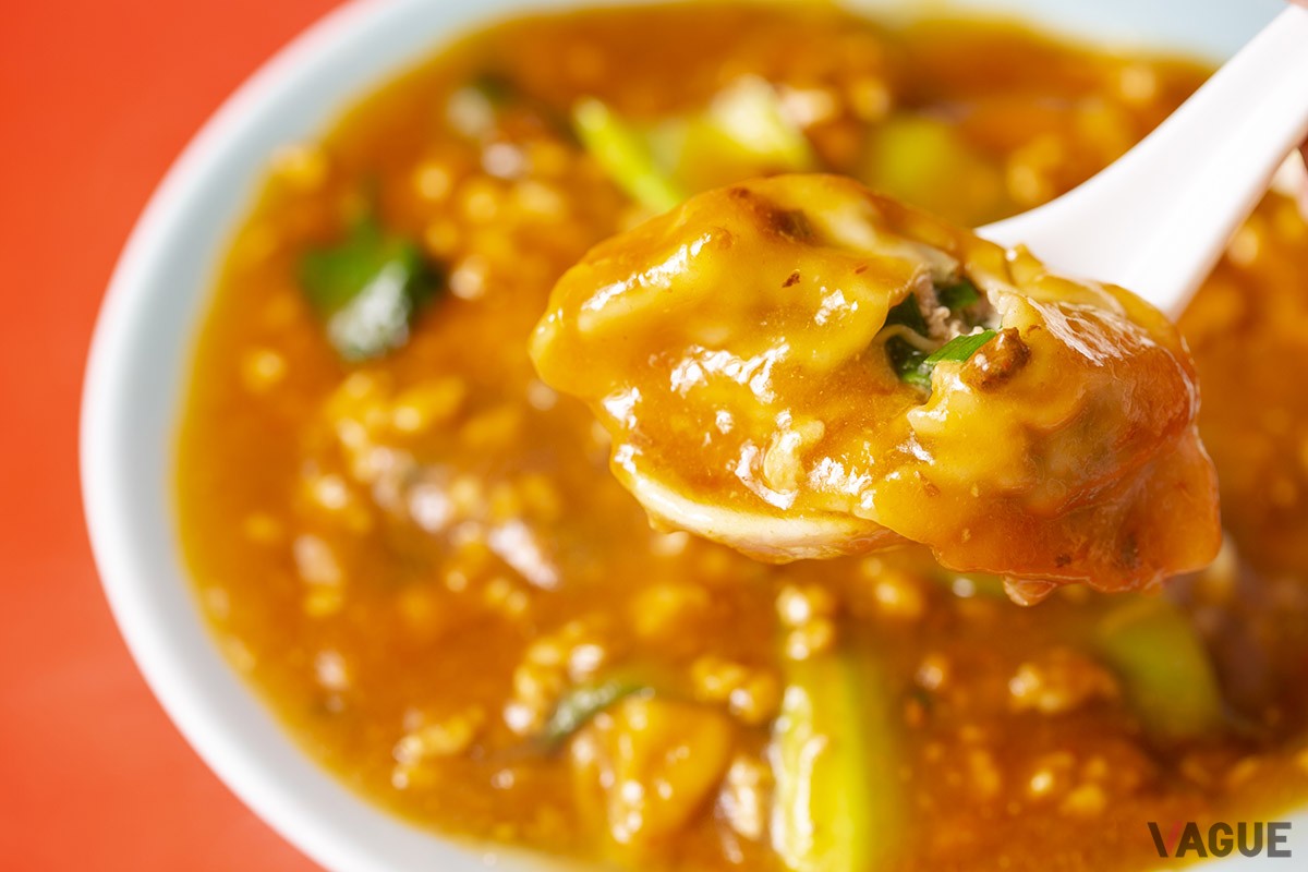 肉味噌あんをたっぷりまとった餃子はトロトロ・ふるふるの食感