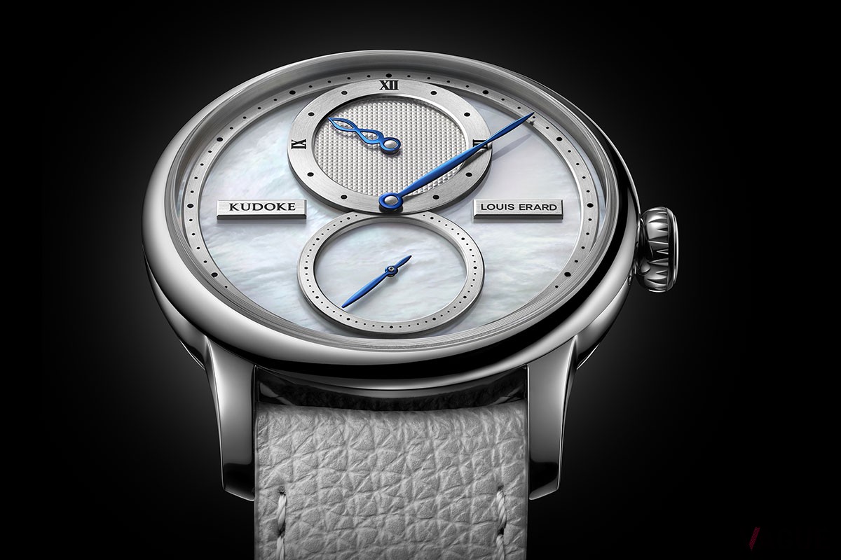 雲海を思わせる幻想的なダイヤルはホワイトマザーオブパールを使用したもの。インダイヤルのリングの立体感、ベゼルの造形と仕上げも見事だ