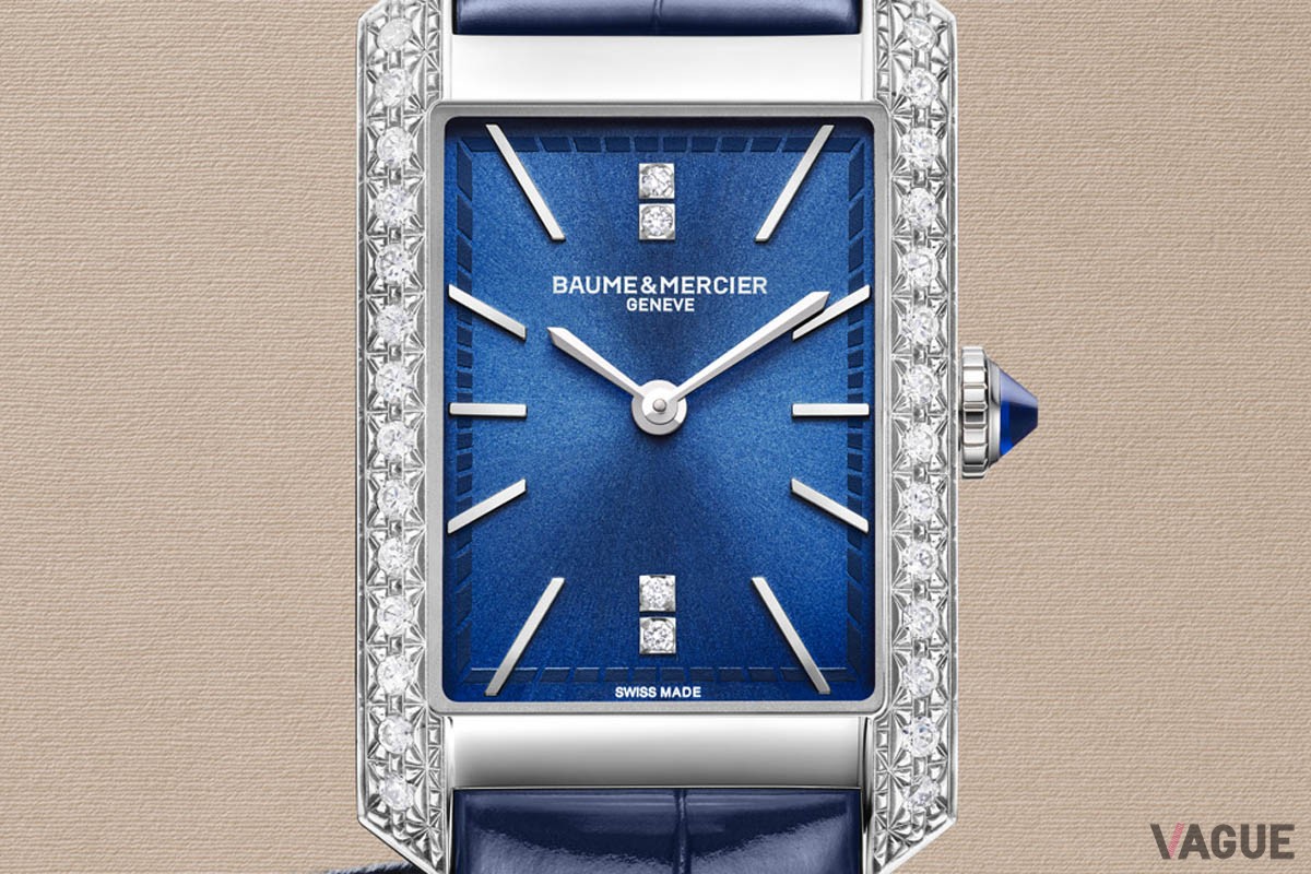 ミッドナイトブルーのダイヤルを配したスレンダーなラインにダイヤモンドをセッティング