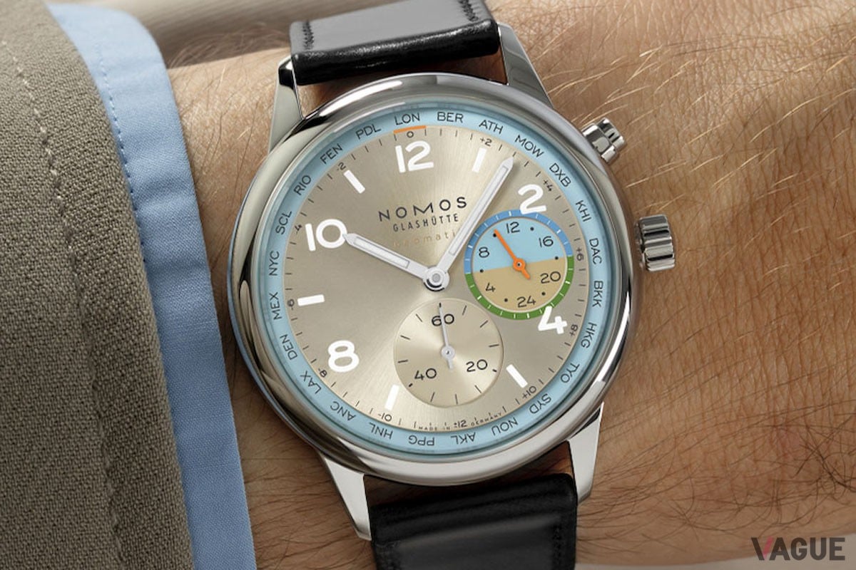 開放的なブルー、グリーン、オレンジカラーが、シャンパンゴールドのダイヤルにアクセントを与える「ローム」