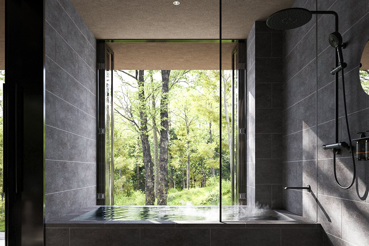 森の景色を望む開放的なバスルーム