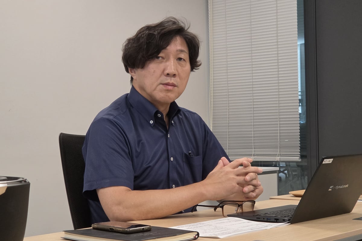 タイガー魔法瓶 執行役員 ソリューション本部長の岡本正範氏。門真本社に技術・製造・販売が集約されていることが、同社のものづくりの特徴だと語った