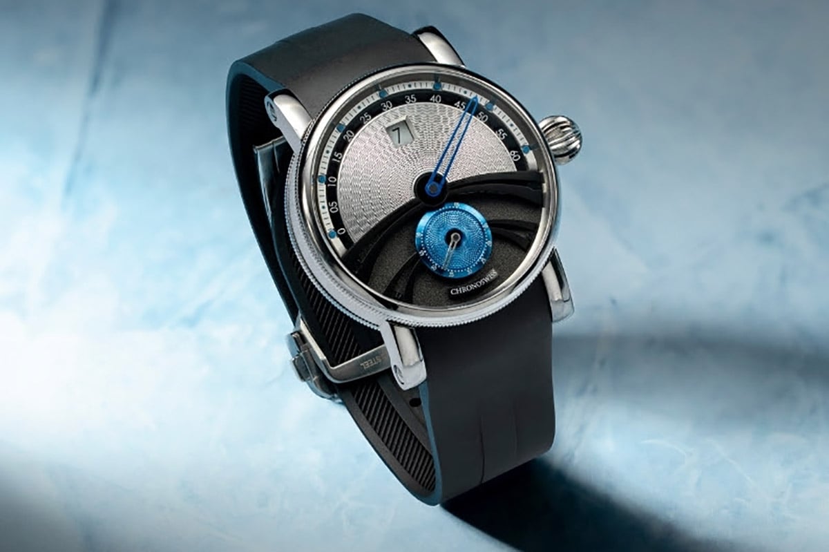クロノスイスの「デルフィス」から登場の氷河をイメージした限定モデル「DELPHIS GLACIER／デルフィス グレイシア」。シルバーとブルーのクールな共演。チタンの静かな輝きが美しい。