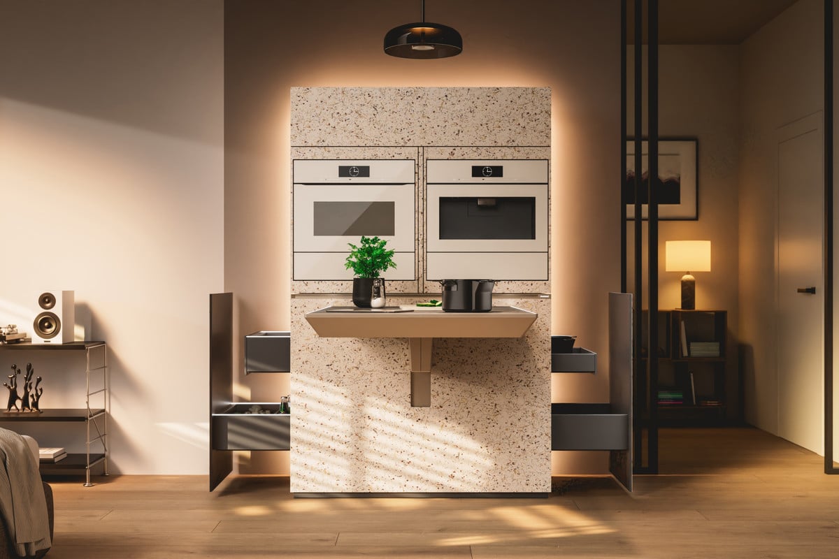 ミラノ市内のMiele Experience Centerで初公開された「Miele Compact Living: Kitchen Unit powered by Hettich」のコンセプト 画像。調理・食事・仕事の機能を一つのユニットに集約する。(photo: Miele)